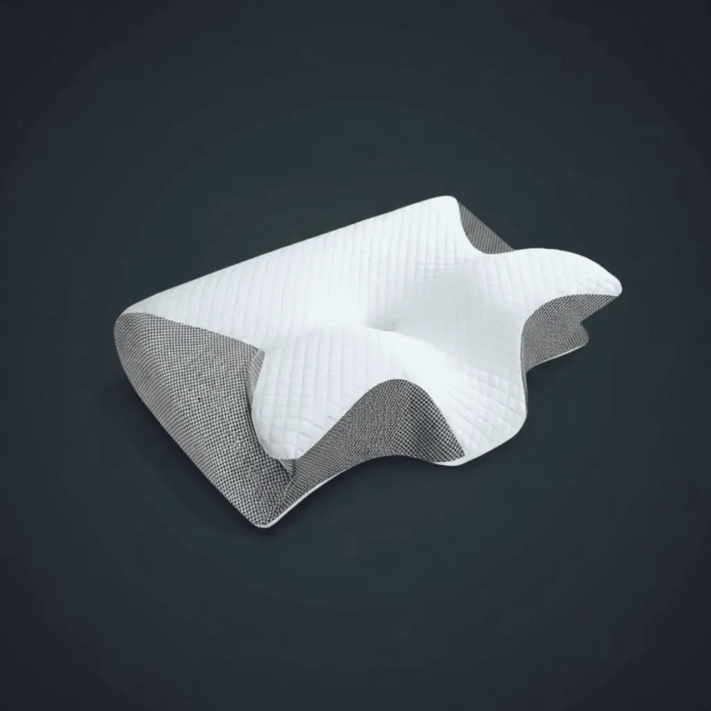 Almohada cervical ergonómica de espuma viscoelástica Noches Sin Tensión sobre fondo oscuro.